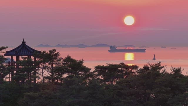 Sunset view with an old pavilion