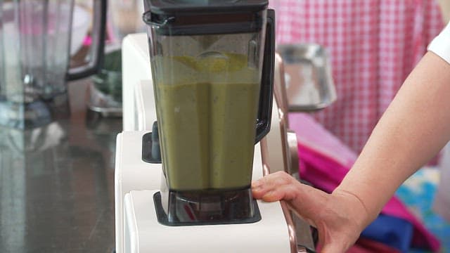 Blending a Pumpkin Smoothie in a Kitchen