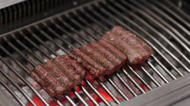 Sizzling Steaks on a Grill