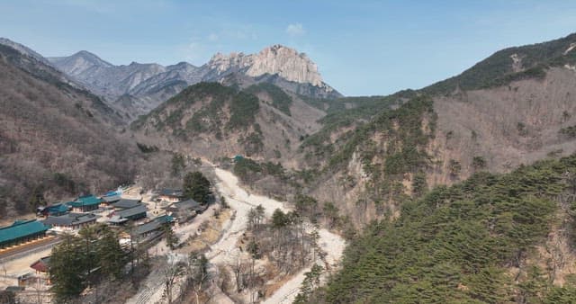 Aerial View of a Temple in the Mountain Valley