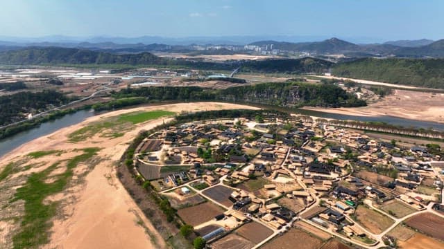 Traditional Korean house village by a river