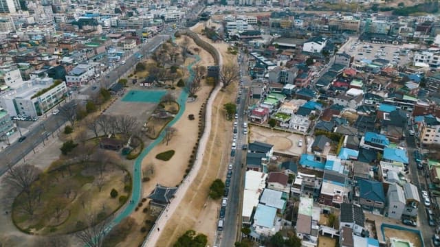 Fortress walls of Suwon Hwaseong in a densely populated area