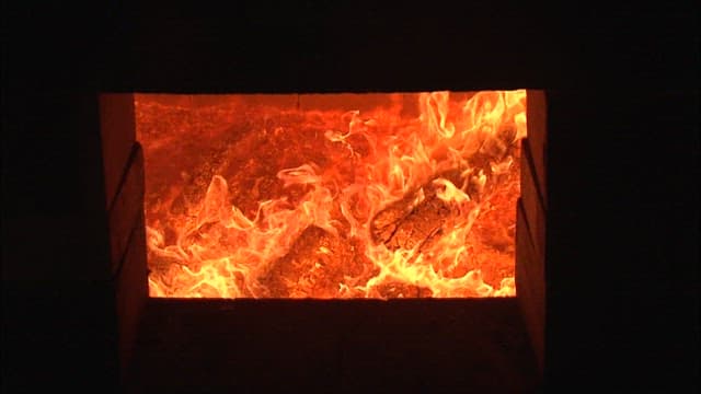 Fierce flame burning hot inside a kiln