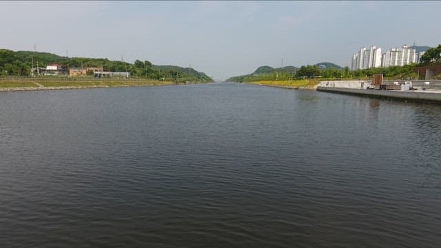 Large Canal Running Between Cities