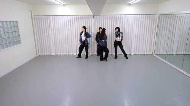 K-POP Dancers Practicing in a Studio