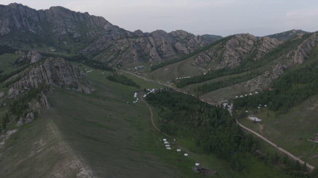 Rugged Mountainous Terrain with Pastures