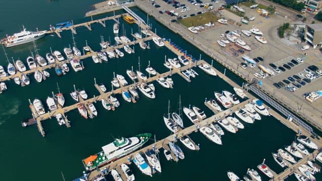 Peaceful afternoon at the marina with numerous yachts and boats docked
