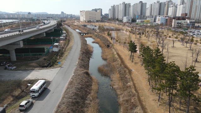 Cityscape with a river and highway