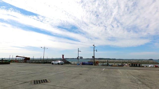Clouds spreading over the waterfront parking lot