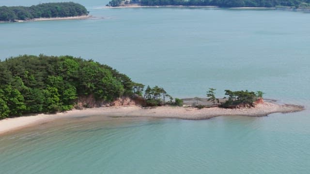 Small island surrounded by calm sea