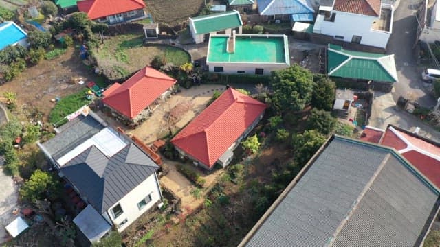 Aerial view of a village with red roofs
