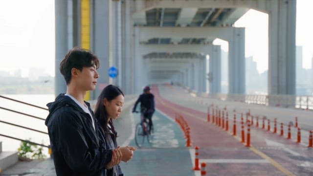 Couple walking on the Jamsu bridge