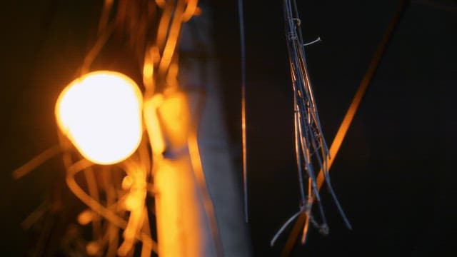 Streetlight illuminating tangled wires