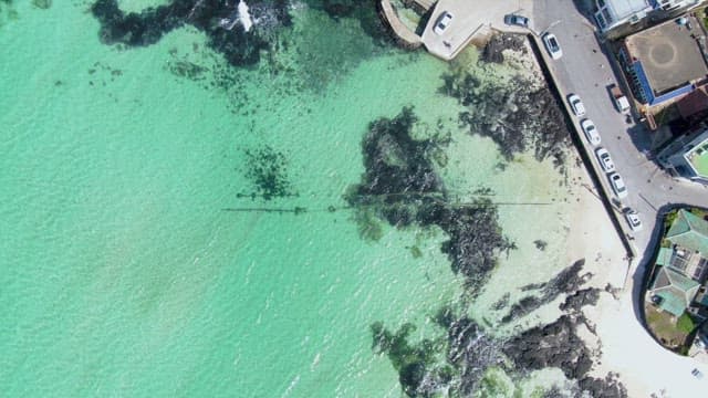 Coastal village with turquoise waters