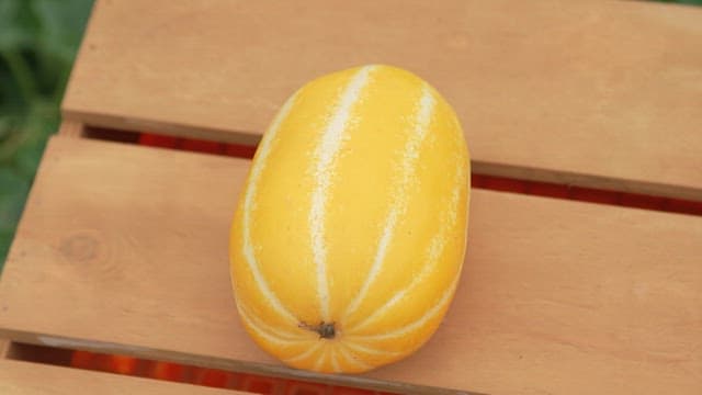 Fresh Korean Melons on a Wooden Table
