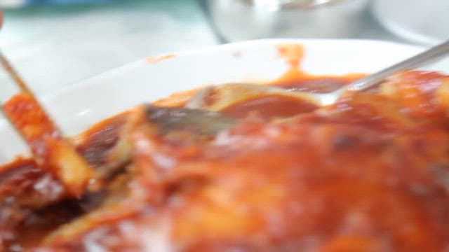 Potatoes in spicy assorted braised fish