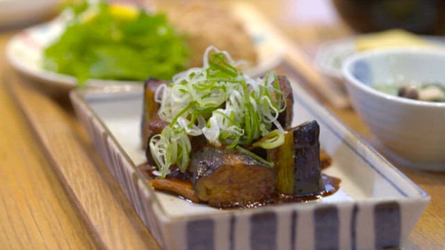 Table of rice neatly arranged with appetizing side dishes