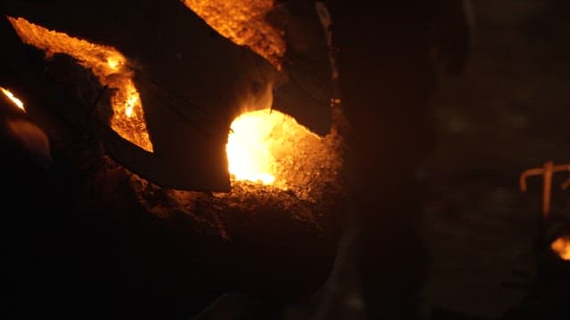 Molten metal pouring into a mold