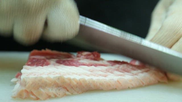 Hand Cutting Pork