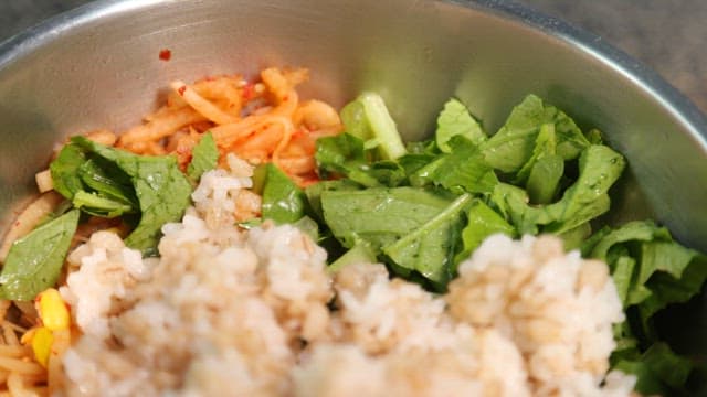 Prepare healthy bibimbap with fresh vegetables, rice, and gochujang