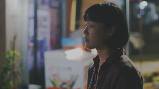 Couple sharing an intimate hug outdoors at night