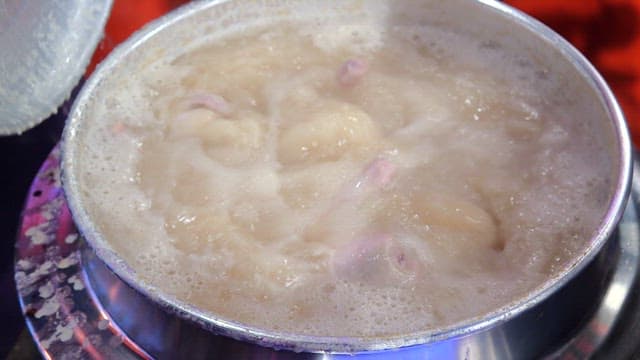 Chicken hotpot boiling in a cauldron
