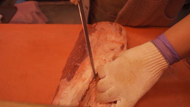 Cutting Meat on a Cutting Board