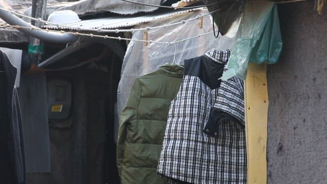 Clothes Hanging on a Clothesline in a Shantytown