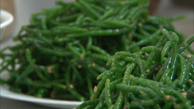 Fresh green glasswort piled on a plate
