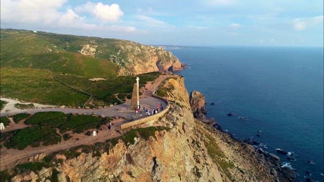 Coastal Landscape in Cabo da Roca with Lighthouse and Visitors