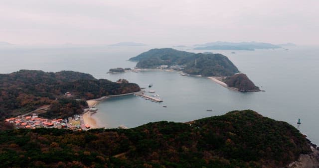 Autumn-Colored Forests and Coastal Villages