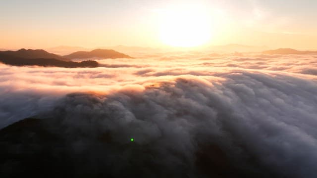 Sunrise over clouds