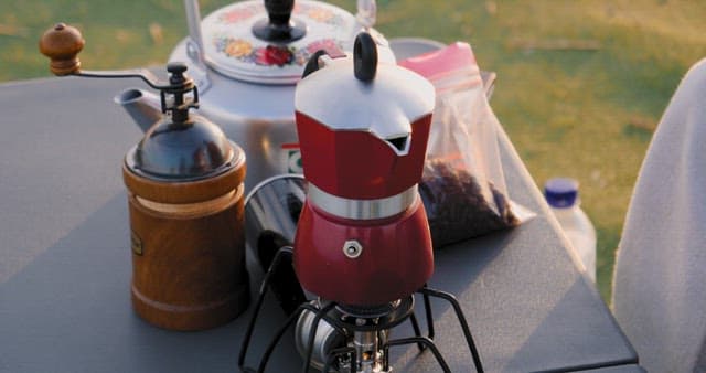 Making Fresh Coffee Outdoors at Sunset