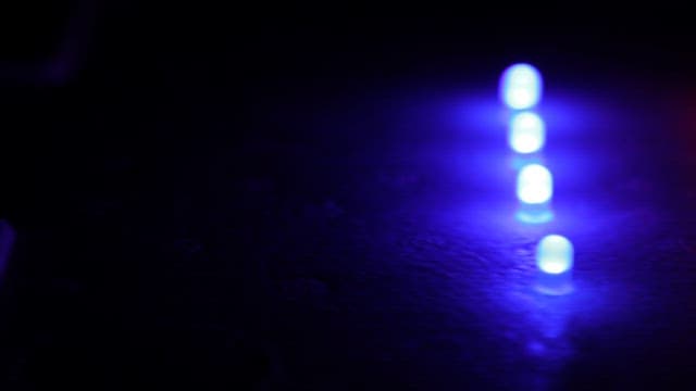 Multi-colored LED Lights Illuminated Against a Dark Background