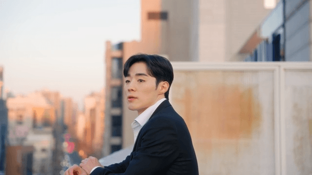 Man sighs on the rooftop