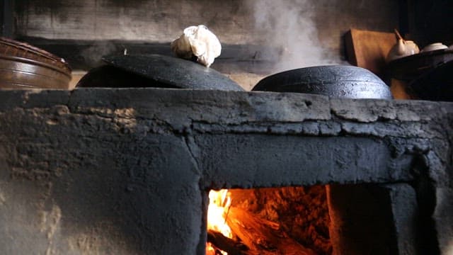 Traditional Korean Cooking in a Rustic Kitchen