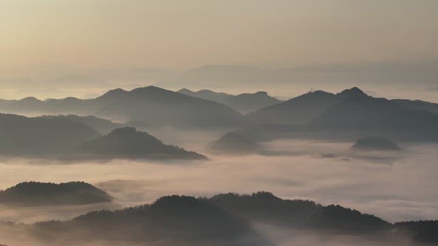 Misty Mountain Peaks at Dawn