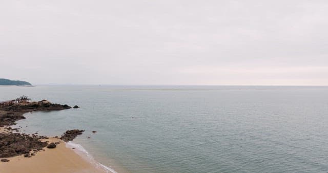 Serene Coastal Landscape with Pavilion