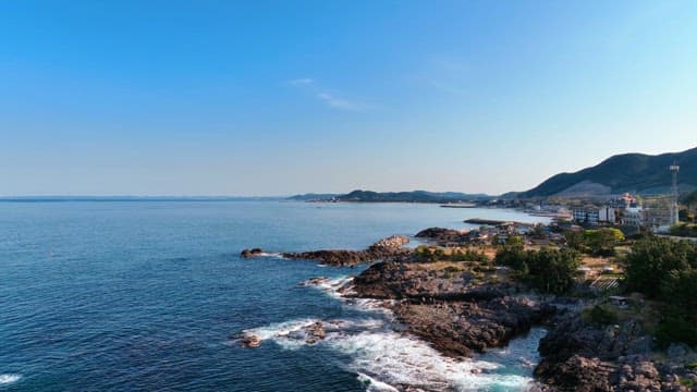 Coastal landscape with clear blue sea