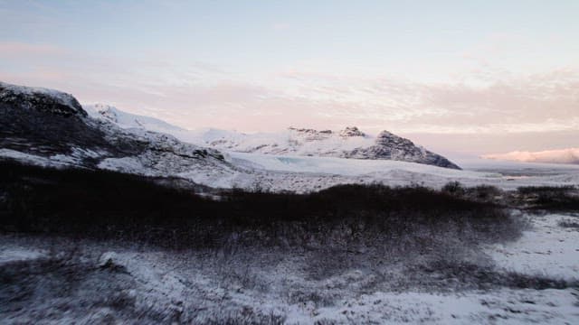 Snow-covered mountains and vast landscape