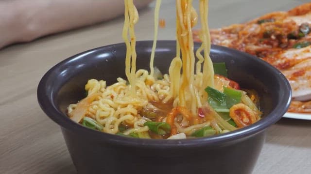 Crunchy kimchi and steaming ramen