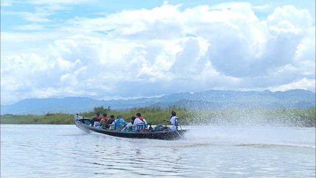 Speedboat journey across a scenic Inle lake