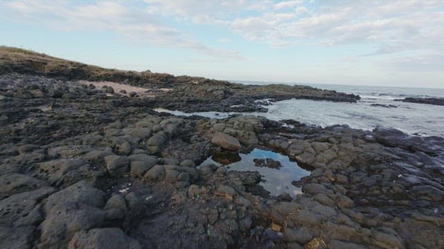 Rocky coastline with waves crashing
