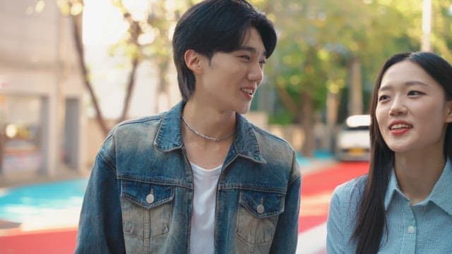 Couple walking down the street on a sunny day