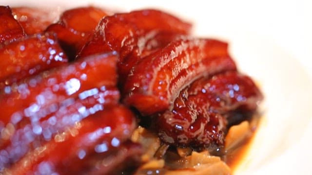 Glazed Red Braised Pork Belly on a Plate