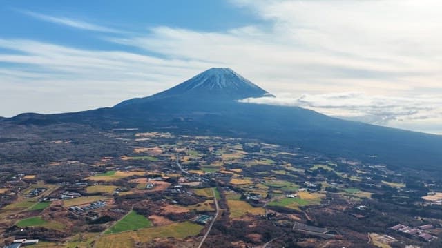 Majestic Mount Fuji with surrounding fields