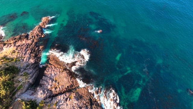 Rocky coastline with clear blue sea