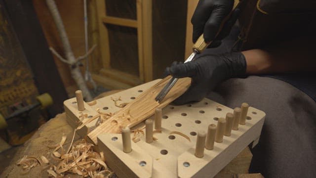 Wood carving with precision in a workshop