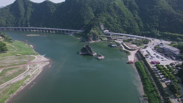 River landscape with bridge and boating area
