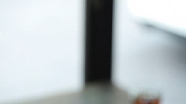 Table with delicious bacon cheese burger with fries and a drink